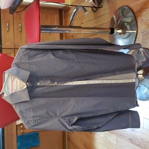 Mens long sleeve new no tags shirt. Has a wimpsical design of small flowers.